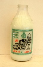 milk bottle :  lovely old Cardiff dairy South Wales Police " Crime message "