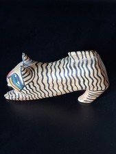 DOWNWARDS STRETCHING WOODEN