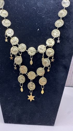 1970s gold tone - tone, coin
