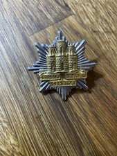 OBSOLETE ORIGINAL SUFFOLK FIRE SERVICE CAP BADGE.