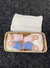 Vintage Doll Figures in Crib -