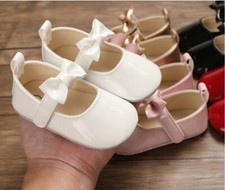 Newborn baby girl - pram, shoes