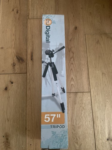 Tripod never used in - 57, used.