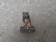 Oldham Crest coat of arms Owl