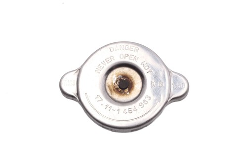 Radiator cap locking pressure