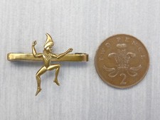 An original pre war brass Girl Guides Brownie bar mounted Pixie promise badge