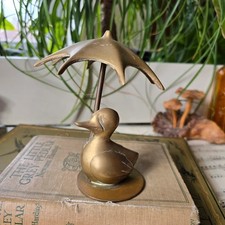 Vintage brass duck under