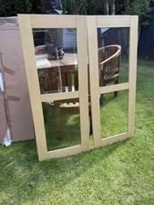 PAIR OF KITCHEN DOORS -SOLID MAPLE GLAZED  497mm X   1212 STOCK DZ617