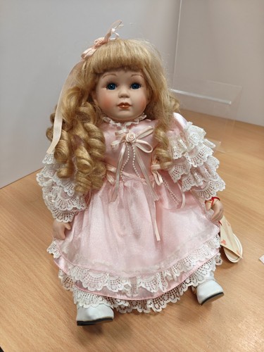 Sitting porcelain doll - sitting,