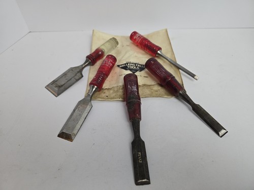 Set assorted chisels with - of,