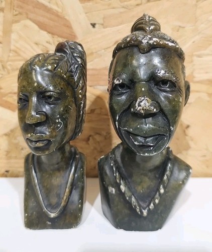 Pair hand carved - a, stone