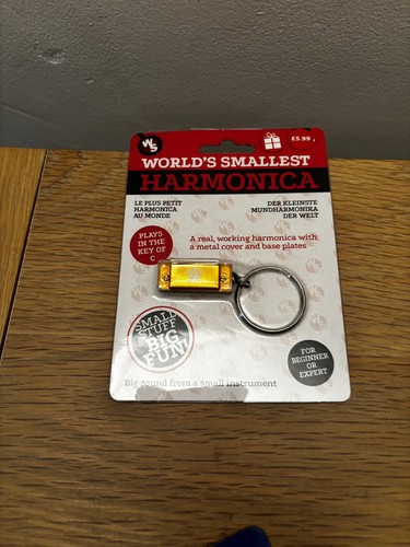 World smallest harmonica - smallest, |