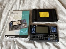 Texas T1-92 graphing calculator never used comes with instruction book.