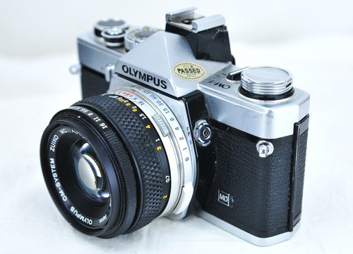 Olympus 35mm camera - om‑1n,