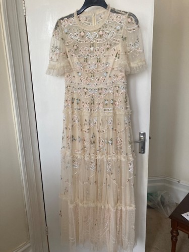 Needle and thread embellished - and,