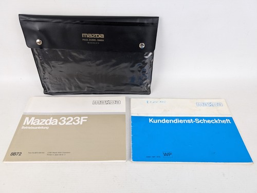 Mazda 323f owners manual - mazda, iv