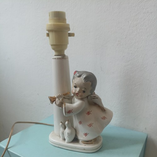 Vintage white ceramic putti