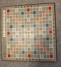 Vintage Scrabble with 4 wooden letter holders, wooden letter tiles. Dated 1948