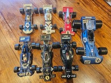 Various toy F1 cars, 6 of them
