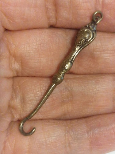 Silver button hook - button,