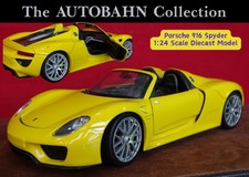 PORSCHE 918 SPYDER IN RACING YELLOW; BIG 1:24 SCALE COLLECTORS DIECASTMODEL CAR