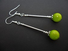 A PAIR OF LIME GREEN PERIDOT