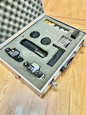A Complete Nikon EM SLR Cameras, Lens & Accessories Kit