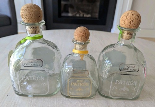 Empty patron tequila bottles - patron,