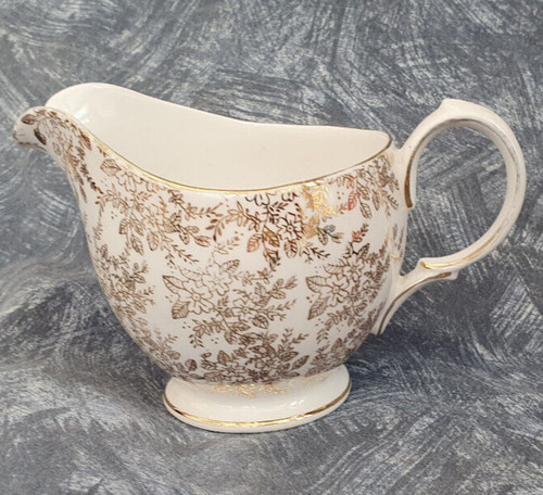 Royal vale gold chintz - —,