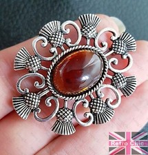 LARGE FAUX AMBER BROOCH