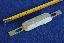 Zinc Anode for boat or yacht - unused. 300g weight. fixing holes 12cm apart