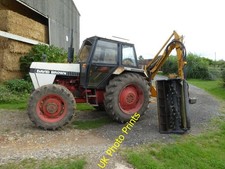 Photo 6x4 Tractor with a hedge