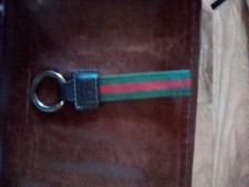 Gucci. Stripe leather and canvas key ring