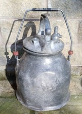 Vintage milking machine churn