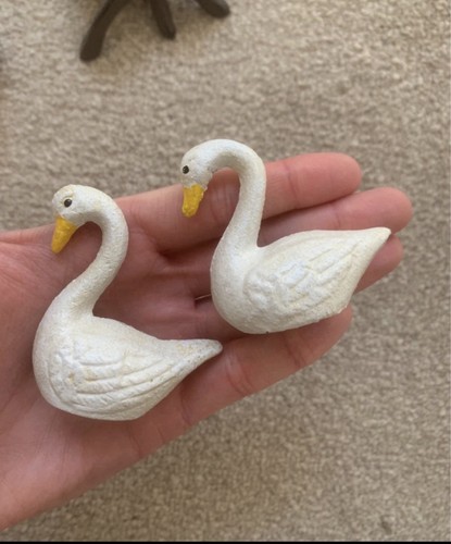 Two small painted - small, cast