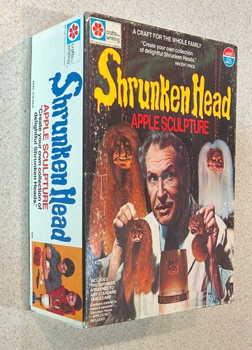 Shrunken head apple sculpture - apple,