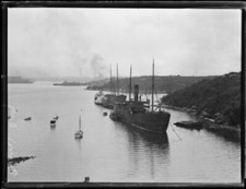 Two yachts tied up at a wharf
