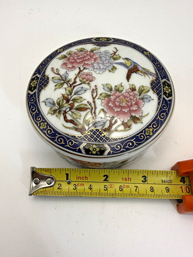 Porcelain floral bird - &,