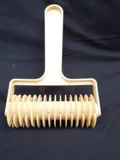 A Lattice Pastry cutter for makig pie tops Ect.