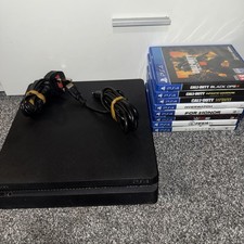 Sony PS4 Slim Console & 8