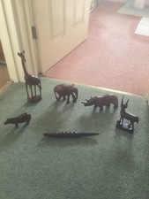 I carved wooden giraffe and other wild animals =6