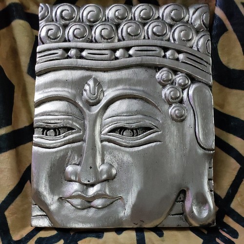 Hand carved buddha - hand, face
