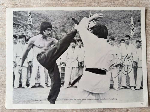Bruce lee sighed photo - bruce,