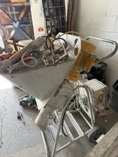 Plastering and rendering machine