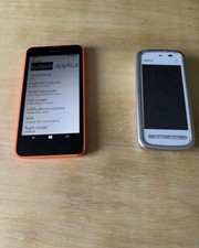 2 Nokia Phones . Lumia And Brick