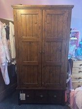 Solid Dark wooden Wardrobe with Concertina Doors