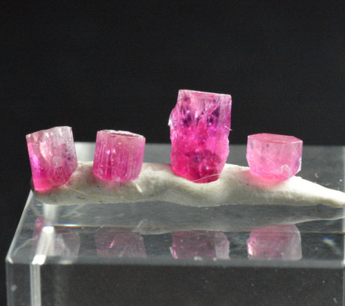 Red beryl facet - facet, rough,