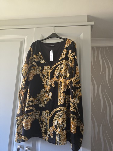 Lovely black and gold yours - lovely,