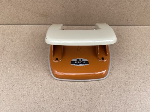 Vintage hole punch - orange, and