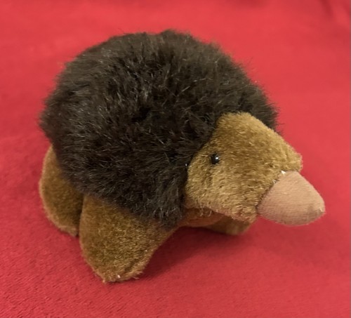 Small brown hedgehog soft - brown, toy